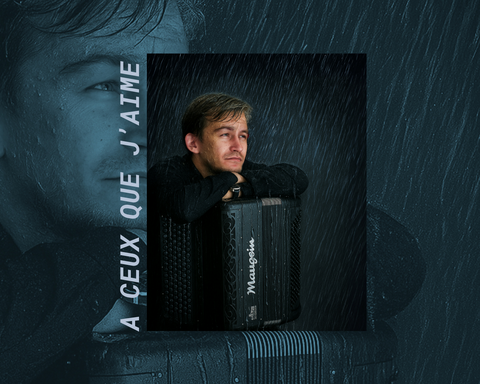 Volodymyr Kashuta photographié avec son accordéon effet pluie